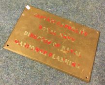 A brass plaque entitled, 'Captain Phillips, Royal