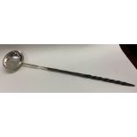 A large 18th / early 19th Century toddy ladle. Approx. 40 grams. Est. £50 - £80.