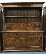 A Brights of Nettlebed oak kitchen dresser. Est. £