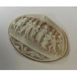 A large oval cameo of figures beneath trees. Appro