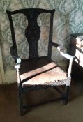 A Georgian oak carver chair. Est. £30 - £40.