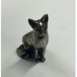 A silver figure of a cat. Marked to tail. Approx. 12 grams. Est. £20 - £30.
