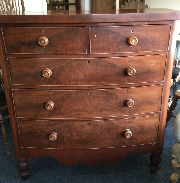 A Victorian mahogany bow front chest. Est. £40 - £