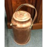 A large old copper water vessel. Est. £30 - £40.