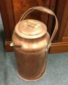 A large old copper water vessel. Est. £30 - £40.