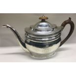 A large George III silver teapot. London 1802. By Alice and George Burrows. Approx. 385 grams.