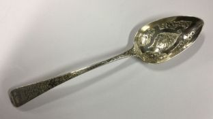 DUBLIN: An attractive engraved silver berry spoon.