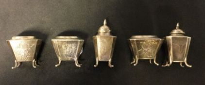 A Chinese five piece hammered silver bamboo design condiment set. Marked WK to base. Circa 1900.