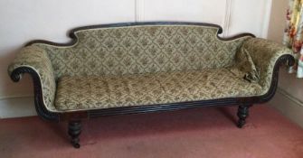 A large Victorian scroll end sofa. Est. £50 - £80.