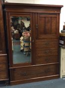 An Edwardian mahogany compactum wardrobe. Est. £60