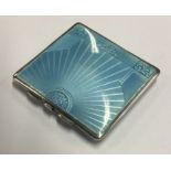A rare double sided silver and enamel case. Birmingham 1935. By Charles S Green and Co. Ltd. Approx.