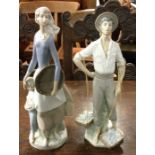 Two tall Lladro figures. Est. £30 - £40.