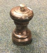 A large silver pepper grinder. London 2003. By R&D. Approx. 212 grams. Est. £30 - £50.
