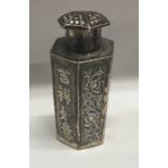 A fine quality Chinese silver pepper decorated with bamboo and flowers. Marked to base. Approx. 26