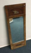 A continental mirror with gilt decoration. Est. £2