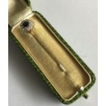 A good sapphire and diamond stick pin mounted as a
