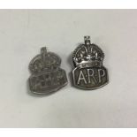 OF ROYAL INTEREST: A rare matched pair of silver badges. Approx. 19 grams. Est. £50 - £80.