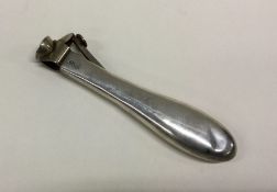 A silver cigar cutter. Approx. 38 grams. Est. £50 - £80.