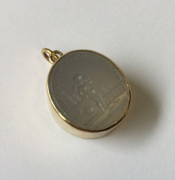 A good antique oval pendant inset with hard stone. - Image 2 of 2