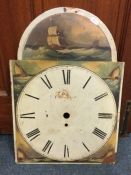 An old grandfather clock face. Est. £10 - £20.