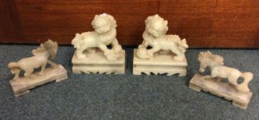 A pair of heavy hard stone Dogs of Foo etc. Est. £