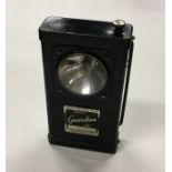A World War II Police battery torch. Est. £20 - £3