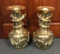 A large pair of heavy brass Chinese vases. Approx.