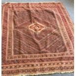 An old rug. Est. £20 -£30.