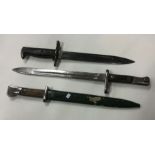 Three good bayonets with reeded handles. Est. £20