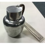 An aluminium RAF Millom exhibit jug with cane hand