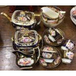 A decorative matched Coalport tea service decorate