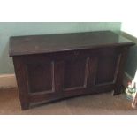 A Georgian oak four panel coffer. Est. £80 - £120.