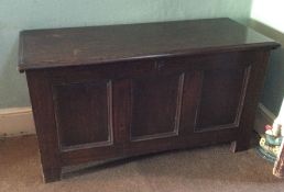 A Georgian oak four panel coffer. Est. £80 - £120.