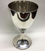 A large George III silver wine goblet. London 1793. By Samuel Godbehere and Edward Wigan. Approx.