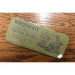 A small rectangular writing kit with hinged top. E