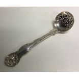A heavy Georgian silver Kings’ Husk pattern sifter spoon. Approx. 35 grams. Est. £50 - £80.