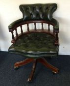 A leather swivel office chair. Est. £30 - £40.