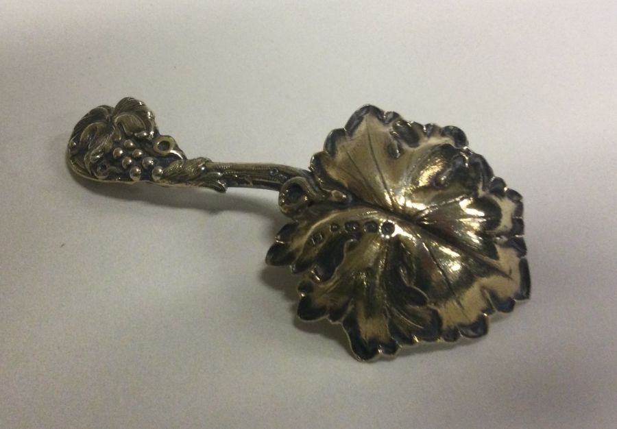A finely chased Victorian silver caddy spoon with vine decoration. London 1839. By Elizabeth - Image 2 of 2
