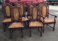 A large set of eleven carved mahogany dining chair