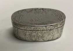 An early mid-18th Century chased silver snuff box. Marked to rim. Approx. 78 grams. Est. £200 - £