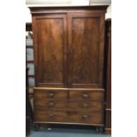 A Victorian mahogany four drawer linen press. Est.