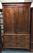 A Victorian mahogany four drawer linen press. Est.