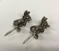 A heavy silver heavy cocktail stick in the form of a rabbit. Approx. 26 grams. Est. £20 - £30.