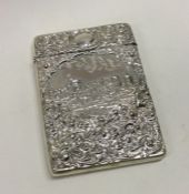 A chased silver card case depicting Windsor castle. Birmingham 1906. By Crissford and Norris Ltd.