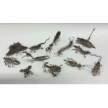 A mixed lot of silver figures of reptiles and insects. Approx. 78 grams. Est. £80 - £120.