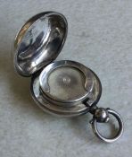 An Edwardian silver sovereign case of plain form.