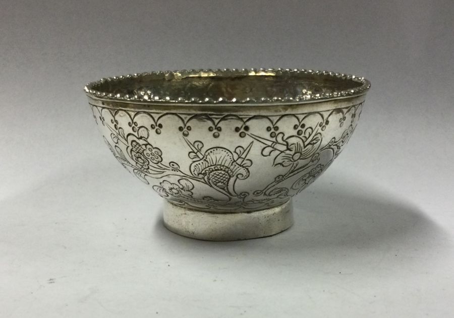 A circular silver bowl of Chinese design. Apparent - Image 2 of 2