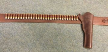 A modern Western gun belt and holster complete wit