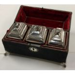 A rare set of George II silver bombe shaped tea ca