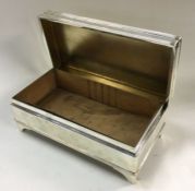 ASPREY & CO: A heavy silver lidded cigar box. Lond
